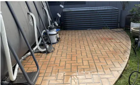 Herringbone pavers around the pool washed after