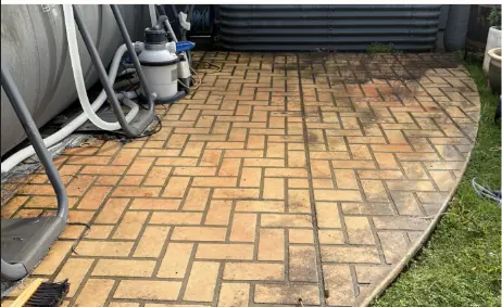 Herringbone pavers around the pool washed before